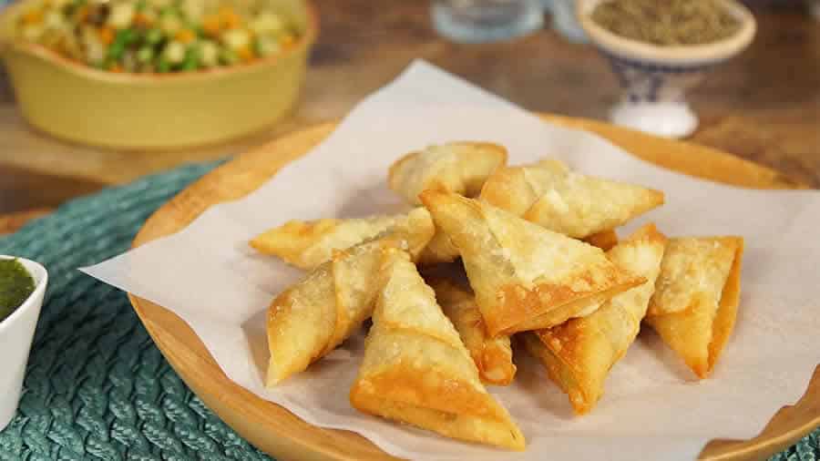 Samoussas au poulet et au curry au Thermomix : recette facile et croustillante
