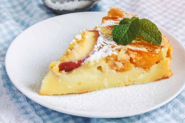 Clafoutis aux pêches et au fromage blanc : Une délicieuse gourmandise estivale